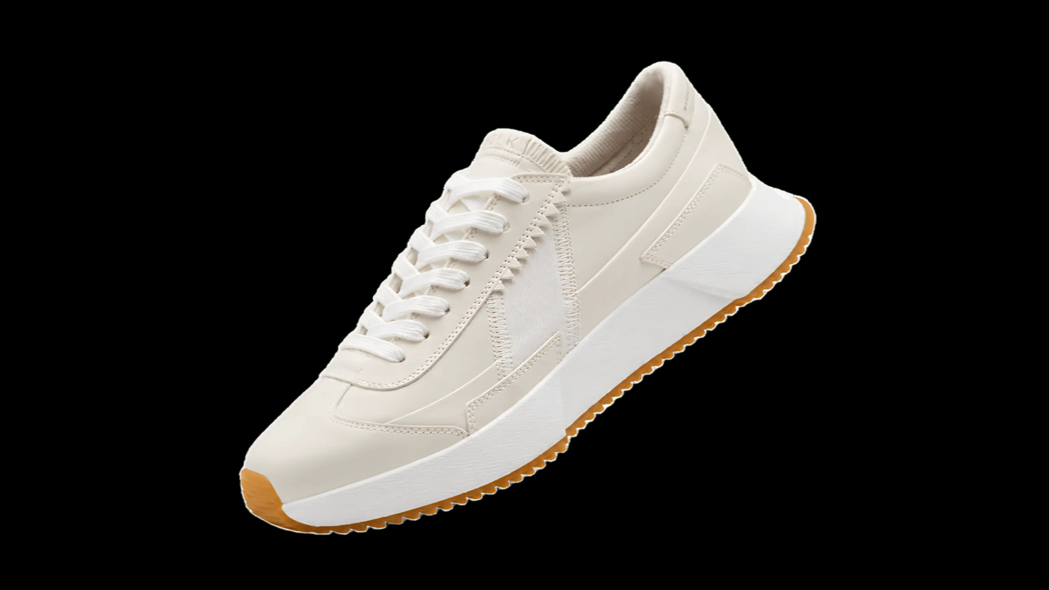 Um tênis de corrida masculino, cinza com detalhes em azul e branco, sobre um fundo branco.